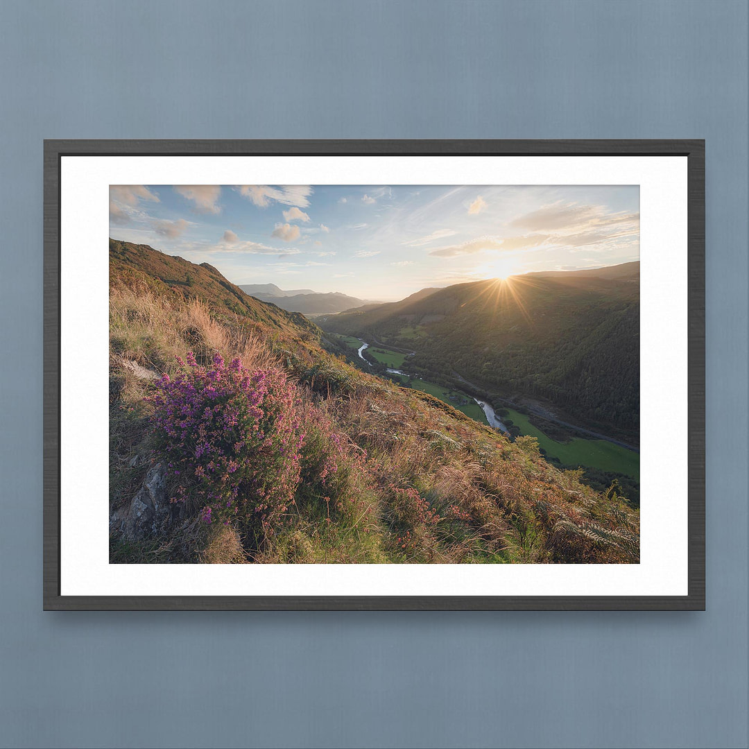 Dolgellau Valley Photography Print - Evening Sunstar and Heathered Slopes - Black Frame Mockup