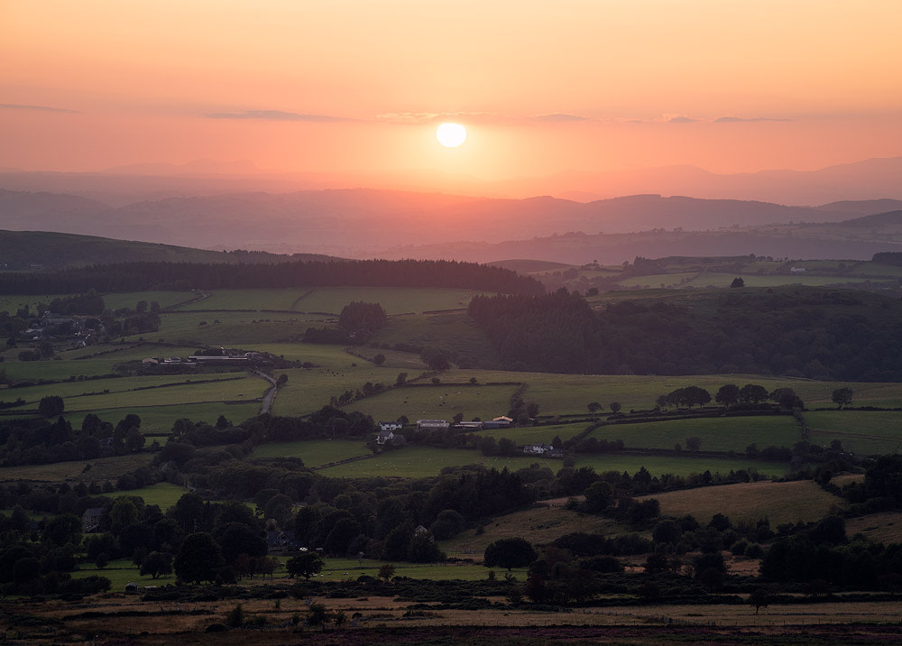 Hazy Summer Sunset over Shropshire Countryside